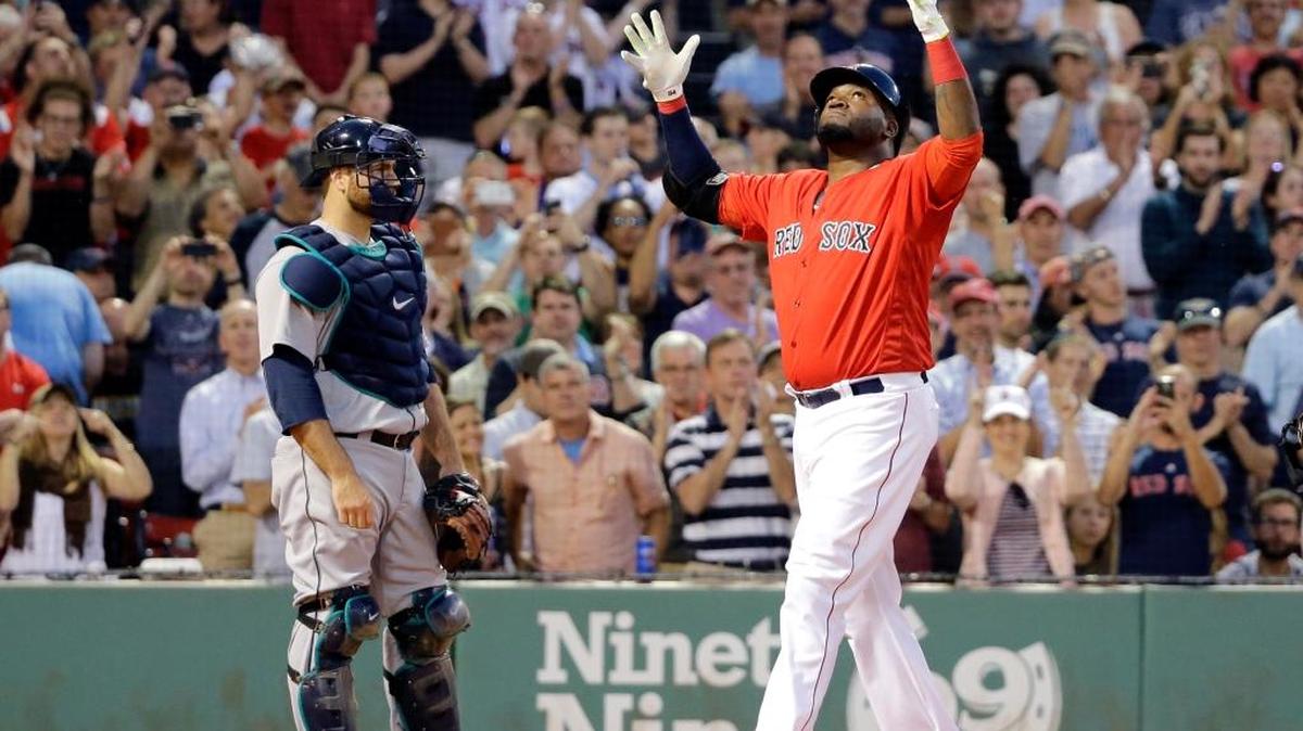 Boston’s David Ortiz points skyward after blasting home run No. 521 of his career against the Seattle Mariners Friday.