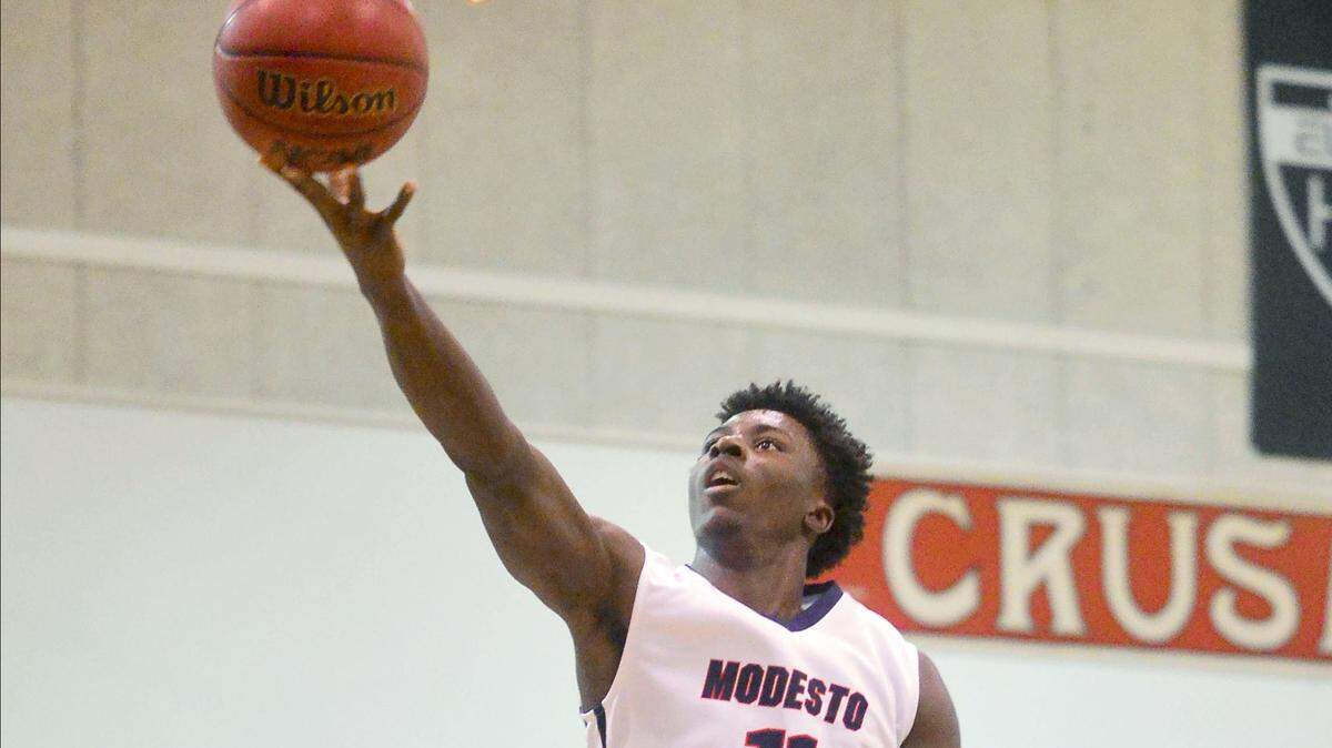 Modesto Christian's Tyler Williams goes up for a layup during the 3rd place game between Modesto Christian and Manteca at the Modesto Christian Hoops Holiday Classic at Modesto Christian High School in Modesto California on December 30, 2016.