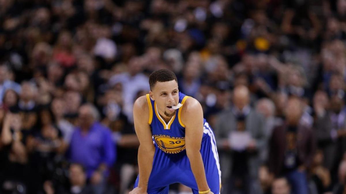 Golden State Warriors guard Stephen Curry (30) watches during a stoppage in play against the Cleveland Cavaliers during the first half of Game 6 of the NBA Finals in Cleveland, Thursday.