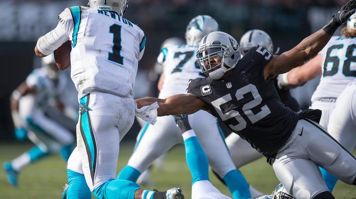 Oakland Raiders defensive end Khalil Mack (52) pressures Carolina Panthers quarterback Cam Newton (1) in the second quarter during an NFL football game, Sunday November 27, 2016 in Oakland.