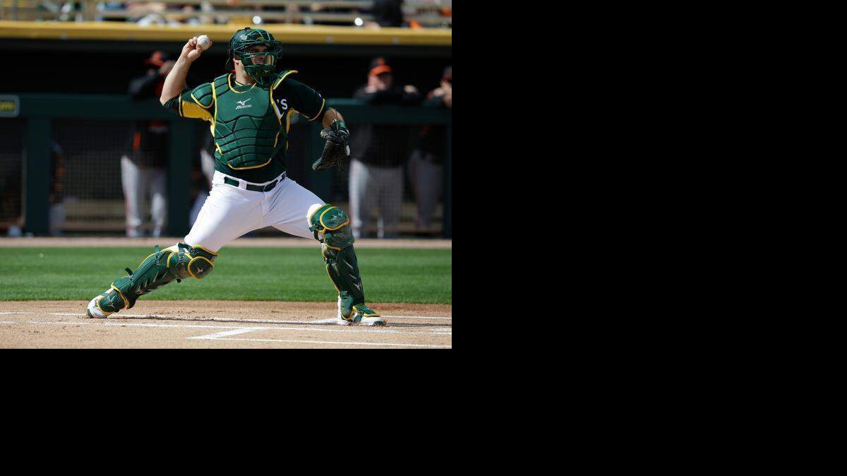 
Catcher Josh Phegley has a good shot at making the A’s Opening Day roster. He also gives baserunners a reason to be wary when he’s behind the plate.
