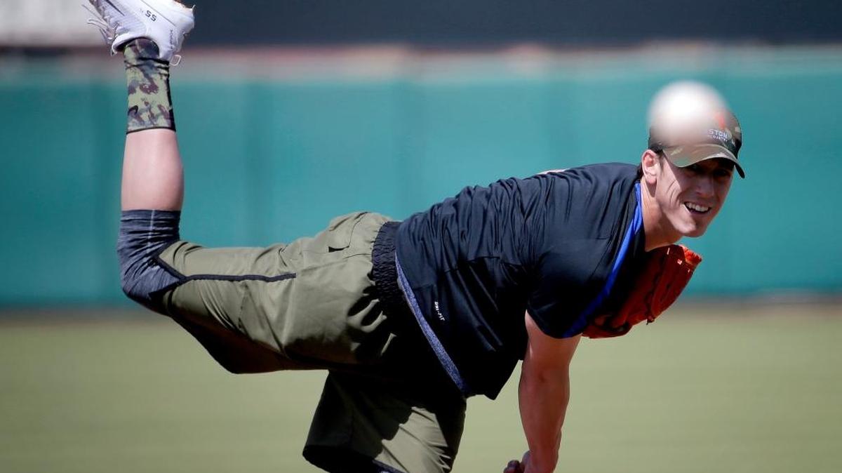Tim Lincecum throws for MLB baseball scouts Friday, May 6, 2016, at Scottsdale Stadium in Scottsdale, Ariz. The former San Francisco Giants pitcher is a free agent working his way back from hip surgery.