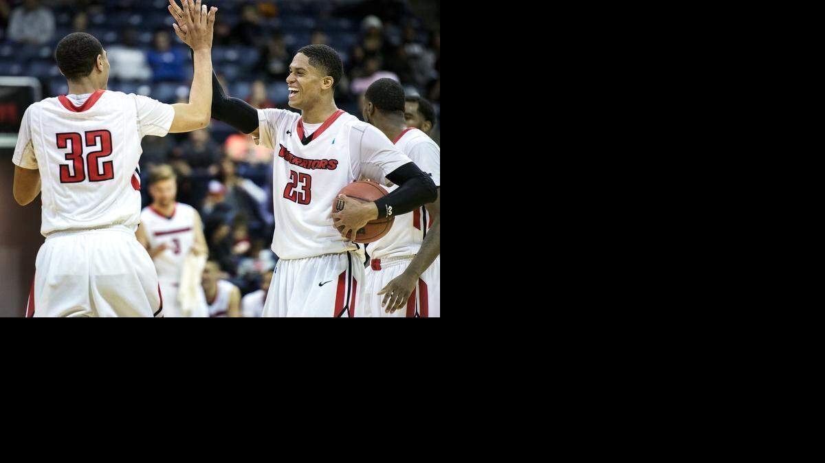 
Wes Bartole, right, and Tyler Barber, left, and their teammates take a 12-point lead over UC San Diego late in the second half during the 2015 California Collegiate Athletic Association Basketball Championships in Stockton, Calif., on Thursday, March, 7, 2015. Stanislaus won the game 61-46. 
