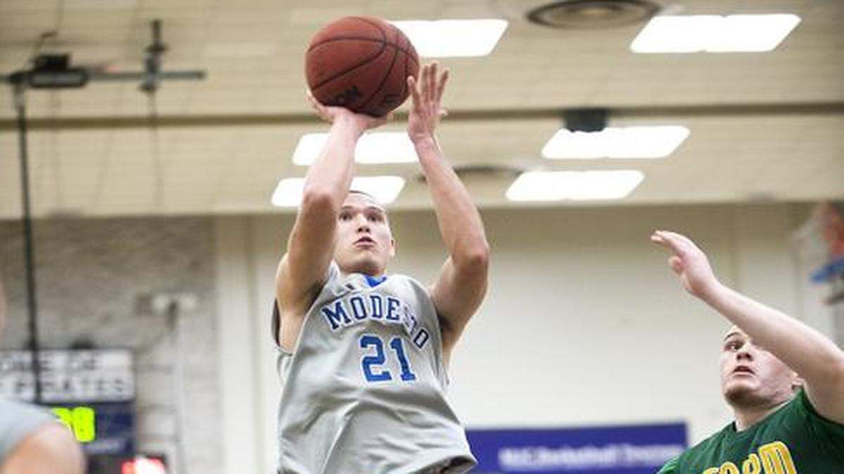 
Modesto's Blake Terry makes a jump shot during the first round game with Napa Valley in the 77th Modesto Junior College Tournament in Modesto, Calif., on Tuesday, December, 16, 2014. 
