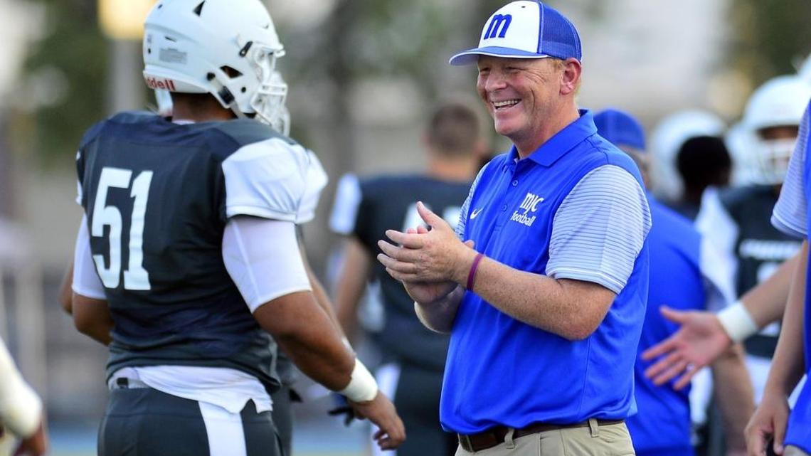 MJC head coach Rusty Stivers smiles after a touchdown during a game between Modesto Junior College and American River College at Modesto Junior College in Modesto, Calif., on Sept. 9, 2017. American River won the game 55-49 in double overtime.