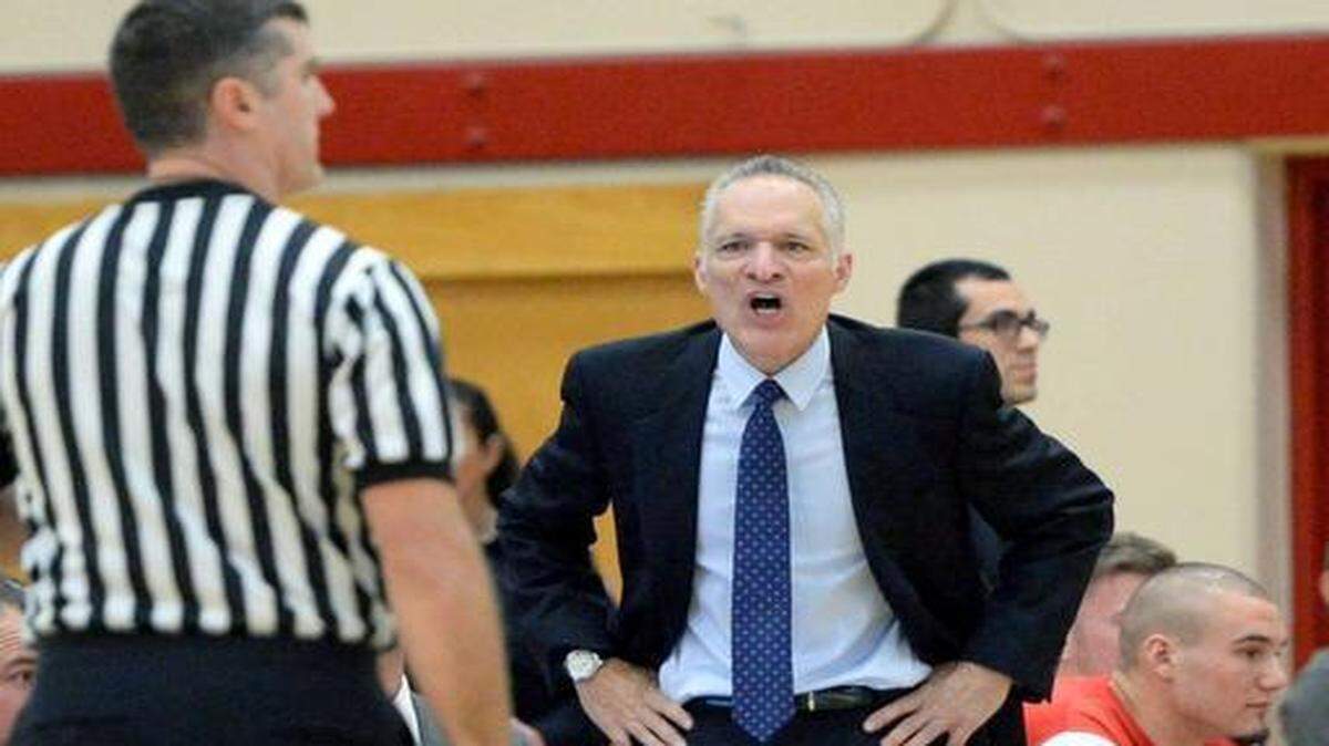 
Stan State head coach Larry Reynolds has a word with a referee during a game between Stanislaus State and Humboldt State in Turlock on Jan. 10, 2015.
