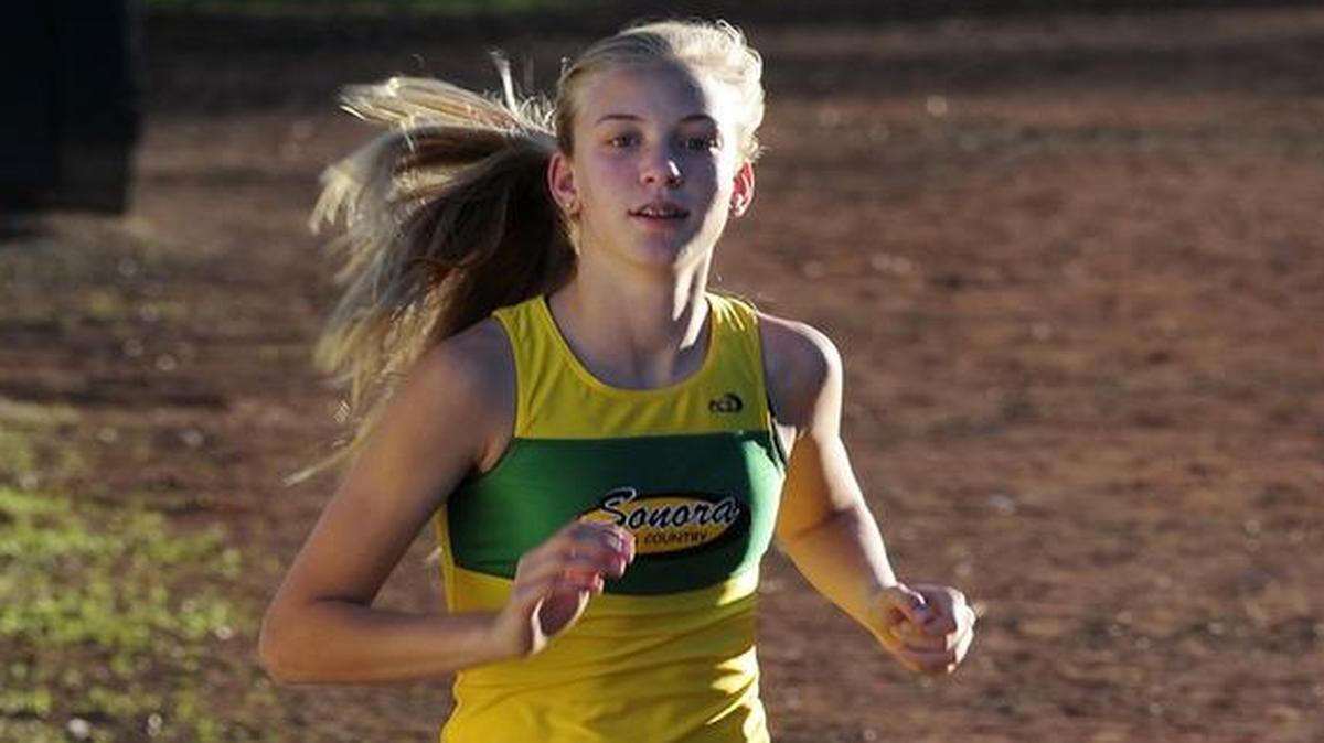 
Cassi Land runs the track at Sonora High School on Tuesday afternoon (01-06-15) in Sonora, CA. She is The Bee's all-district player of the year. 
