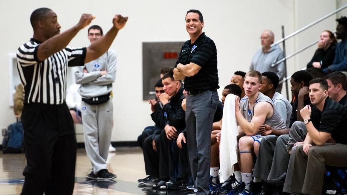 Modesto coach Paul Brogan reacts to a foul call during the 78th Modesto Junior College Invitational Basketball Tournament game with Bristol at MJC in Modesto, Calif., on Wednesday, Dec., 16, 2015.