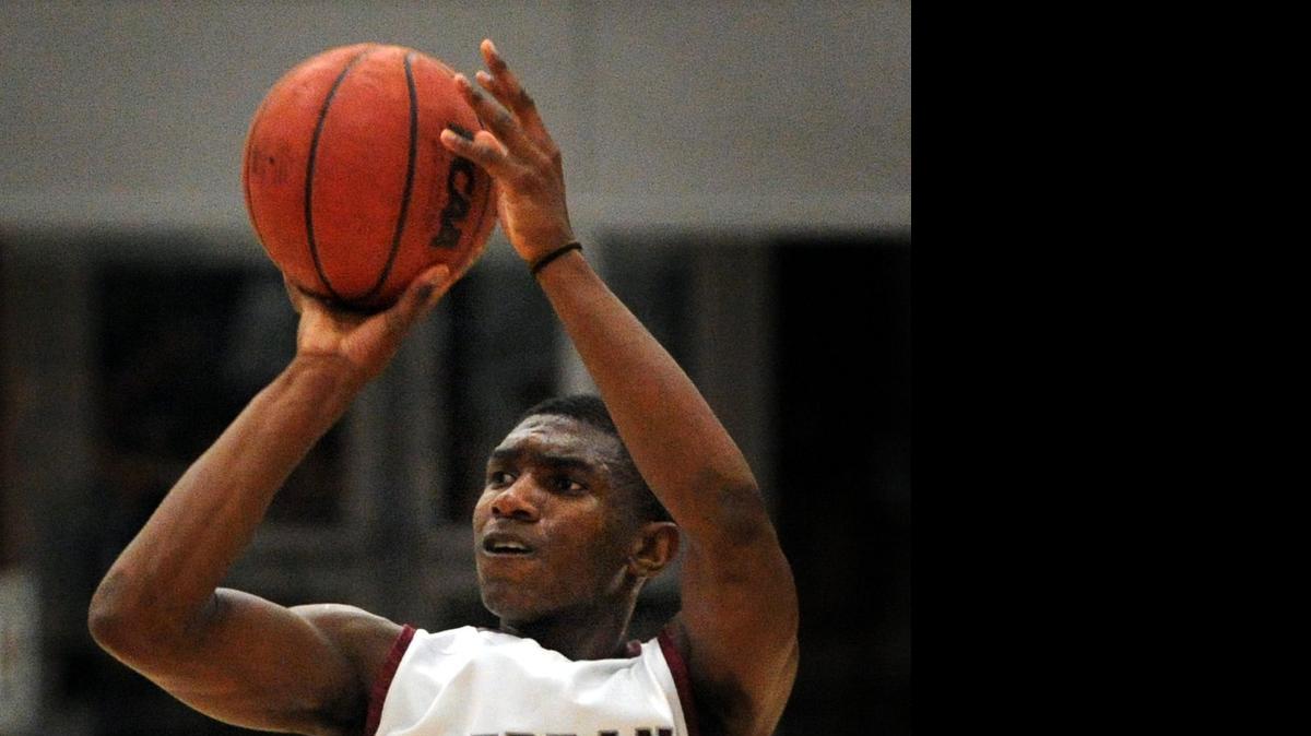 
Rolaun Dunham takes a shot for Riverbank against Bret Harte High School in 2011. After a year at Whitman College in Washington, Dunham will transfer to the University of the Pacific. He will sit out his coming season.
