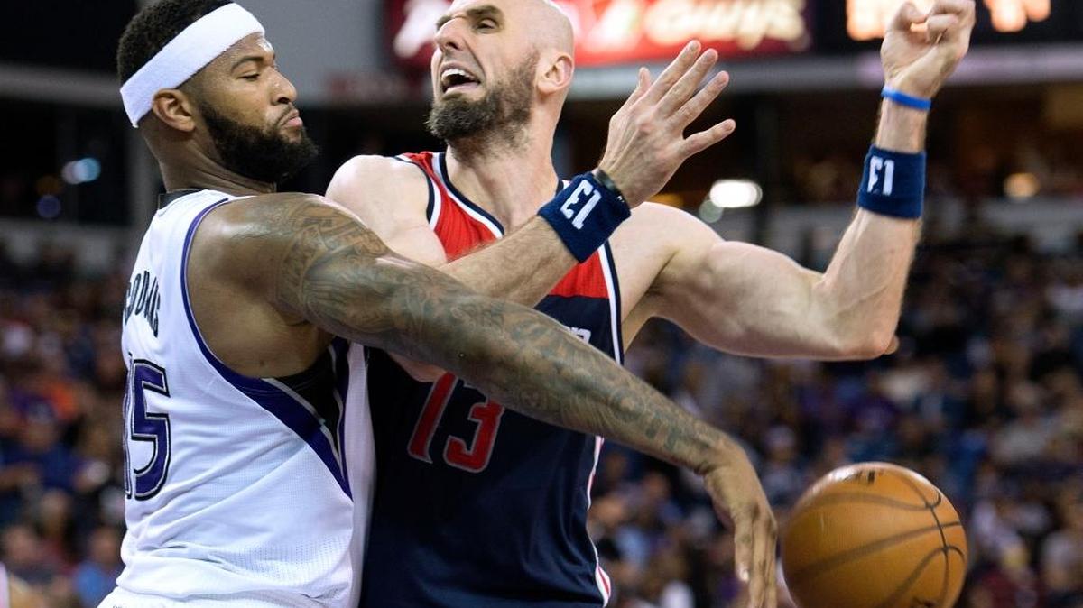 Kings center DeMarcus Cousins strips the ball from Washington’s Marcin Gortat on Wednesday, March 30, 2016 at Sleep Train Arena in Sacramento.