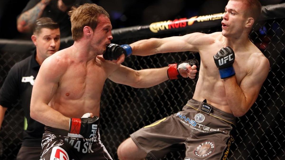 Michael McDonald, right, trades blows against Brad Pickett during their UFC bout in Boston on Aug. 17, 2013. McDonald won this fight but didn’t fare as well on July 13, 2016, when he faced John “Hands of Stone” Lineker in Sioux Falls, S.D.