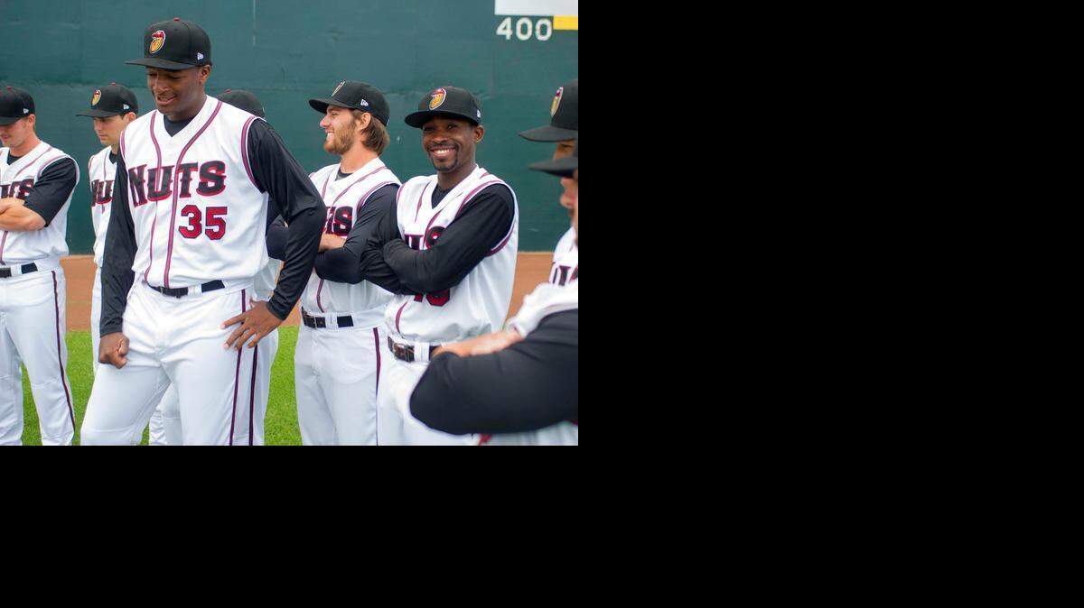 Correlle Prime (35) and other Modesto Nuts teammates relax before the team picture during Nuts Media Day on April 7th, 2015