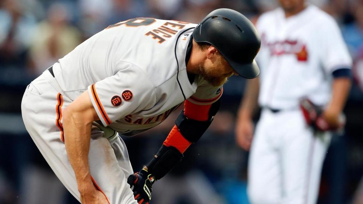 San Francisco Giants outfielder Hunter Pence was put on the disabled list with a hamstring injury and is expected to miss eight weeks. ... Pence pulls up and grabs his injured during a baseball game against the Atlanta Braves, Wednesday, June 1, 2016, in Atlanta.