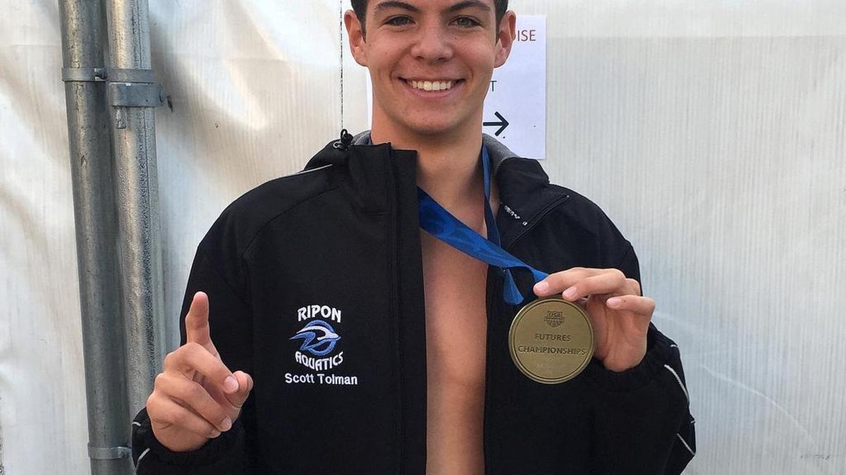 
Sierra High’s Scott Tolman, 17, poses with the gold medal he won in the 200-meter breaststroke at the Mt. Hood Futures Championships in Oregon on Saturday, Aug 1. Tolman won with a time of 2:18.45, six-hundredths of a second off an Olympic Trials qualifying time. 
