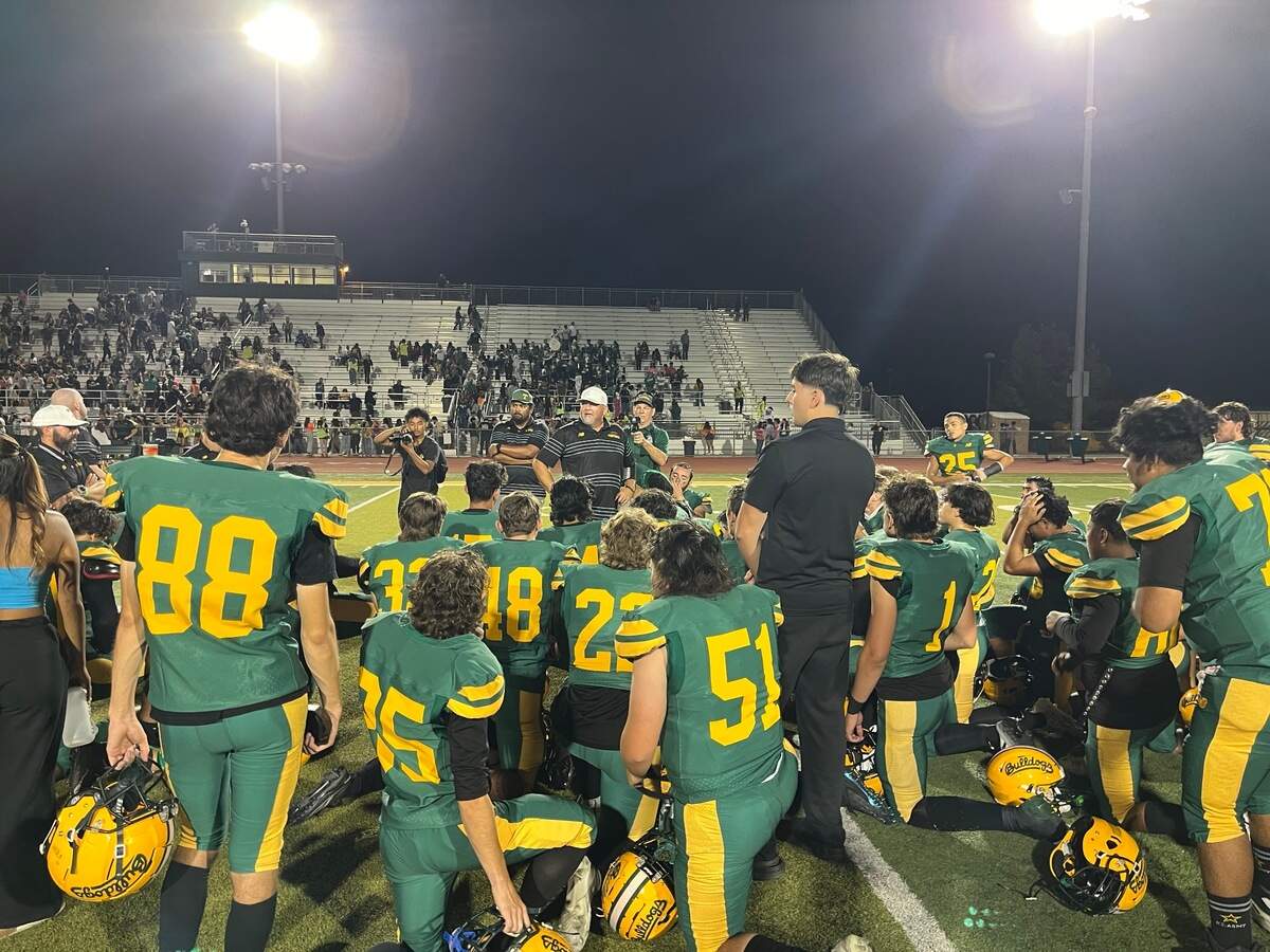 Tracy head coach Jeff Pribble addressing his team after 24-19 loss to Turlock at Wayne Schneider Stadium in Tracy, California, on August 30, 2024.