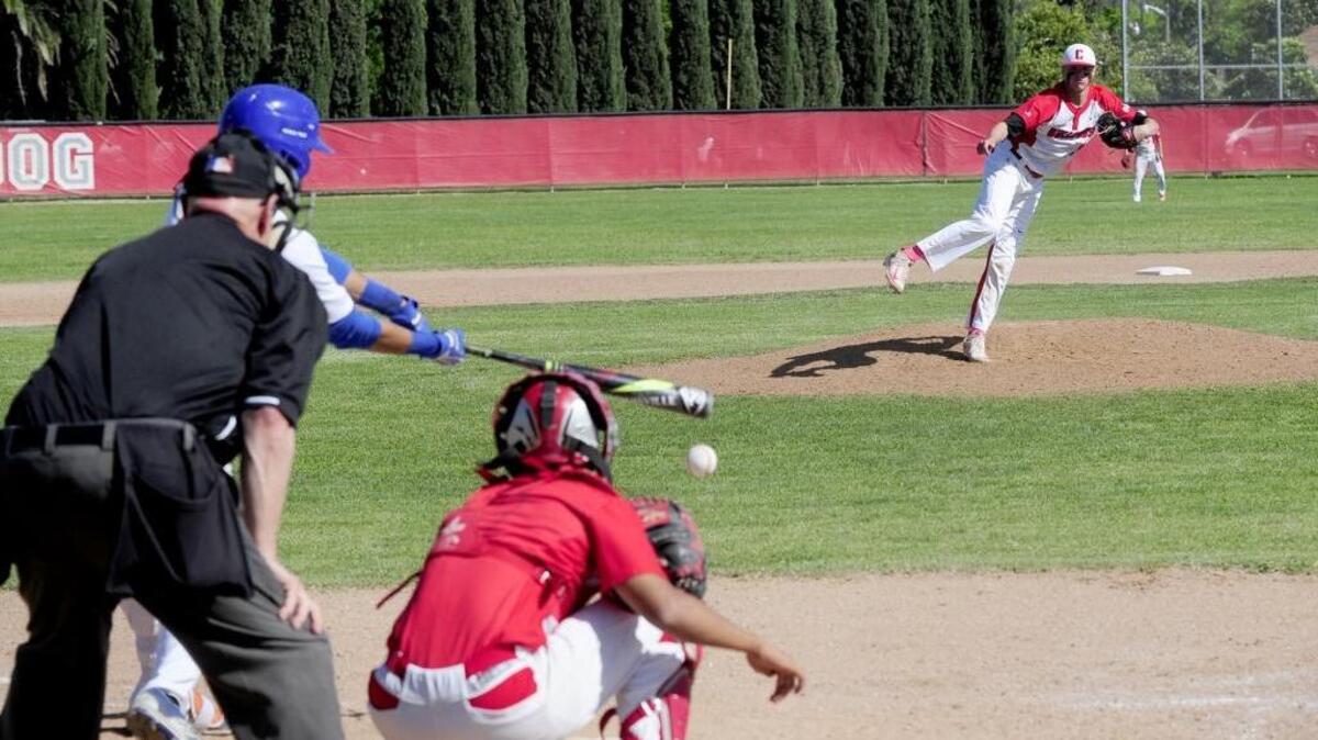 Blane Abeyta (11) strikes out a Kimball batter with a hanging curve ball during the Art McRae Tournament final at Ceres High School between Kimball High of Tracy and Ceres High.
