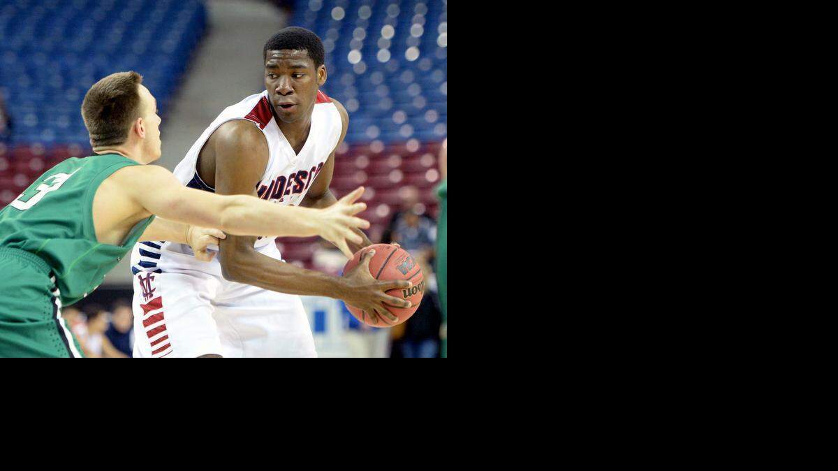 
Modesto Christian's Anthony Townes sizes up his opponent during the CIF San-Joaquin Section Division II semifinal between MC and St. Mary's at the Sleep Train Arena in Sacramento on March 4th, 2015.
