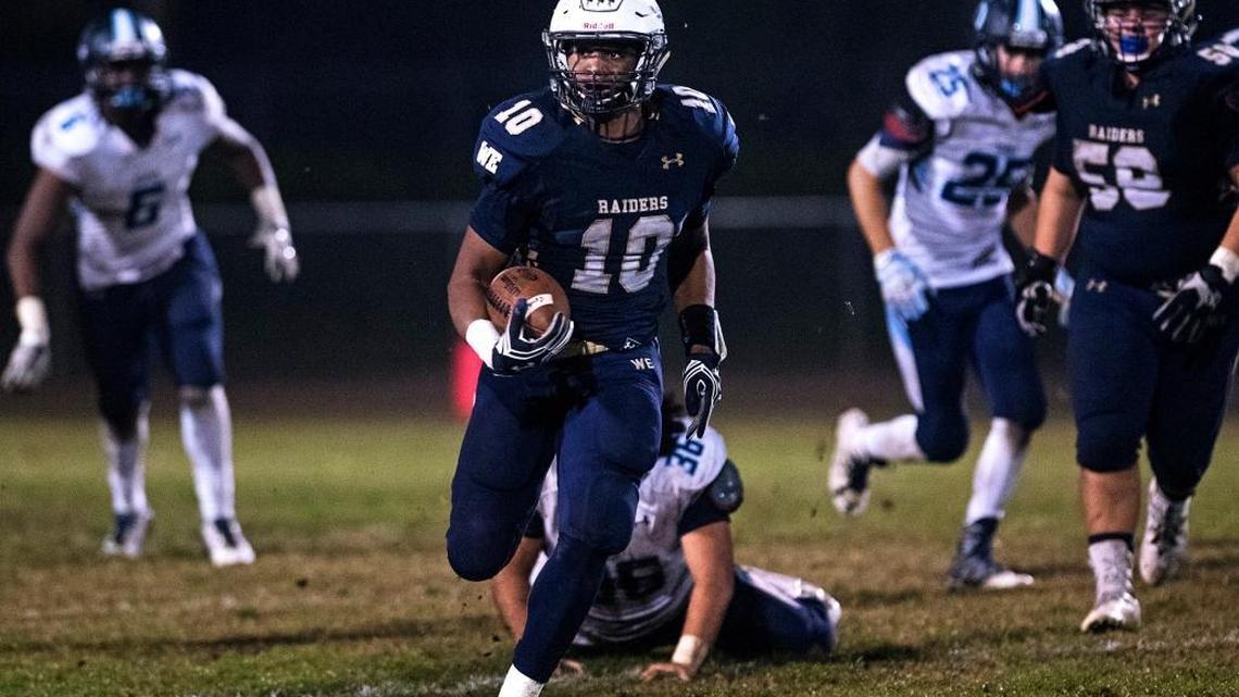Central Catholic running back Montell Bland runs for a gain during the first round Sac-Joaquin Section playoff game with Downey at Central Catholic High School in Modesto, Calif., on Thursday, November 10, 2016.