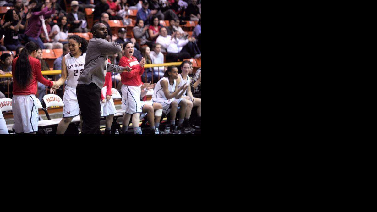 
Modesto Christian Coach Robb Spencer tells his players to get back on defense, in the section semi-final basketball game between Modesto Christian High and Del Oro High, at the University of the Pacific in Stockton, on Tuesday (3-3-15). 
