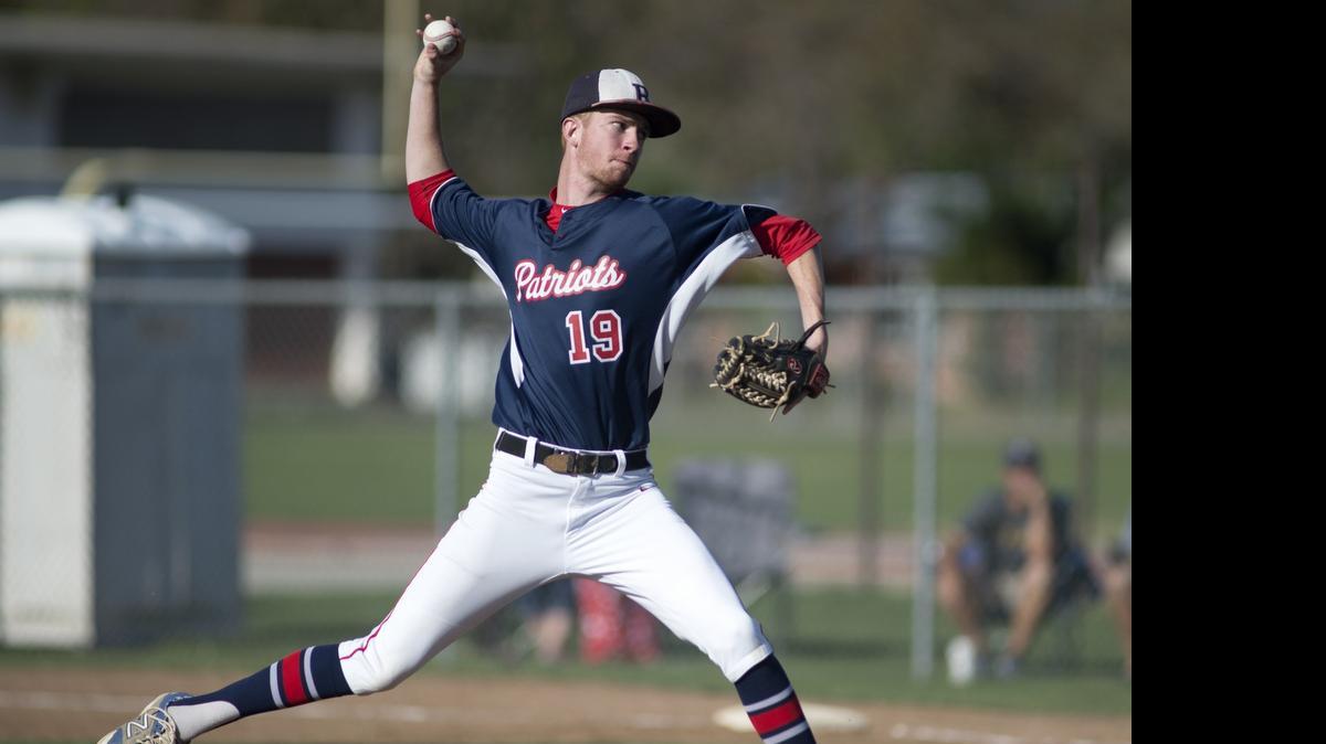 
Beyer High senior Micah Hall pitches against Ripon in the Windemuth Tournament championship game on April 10, 2015, at Modesto High School in Modesto, Calif.

