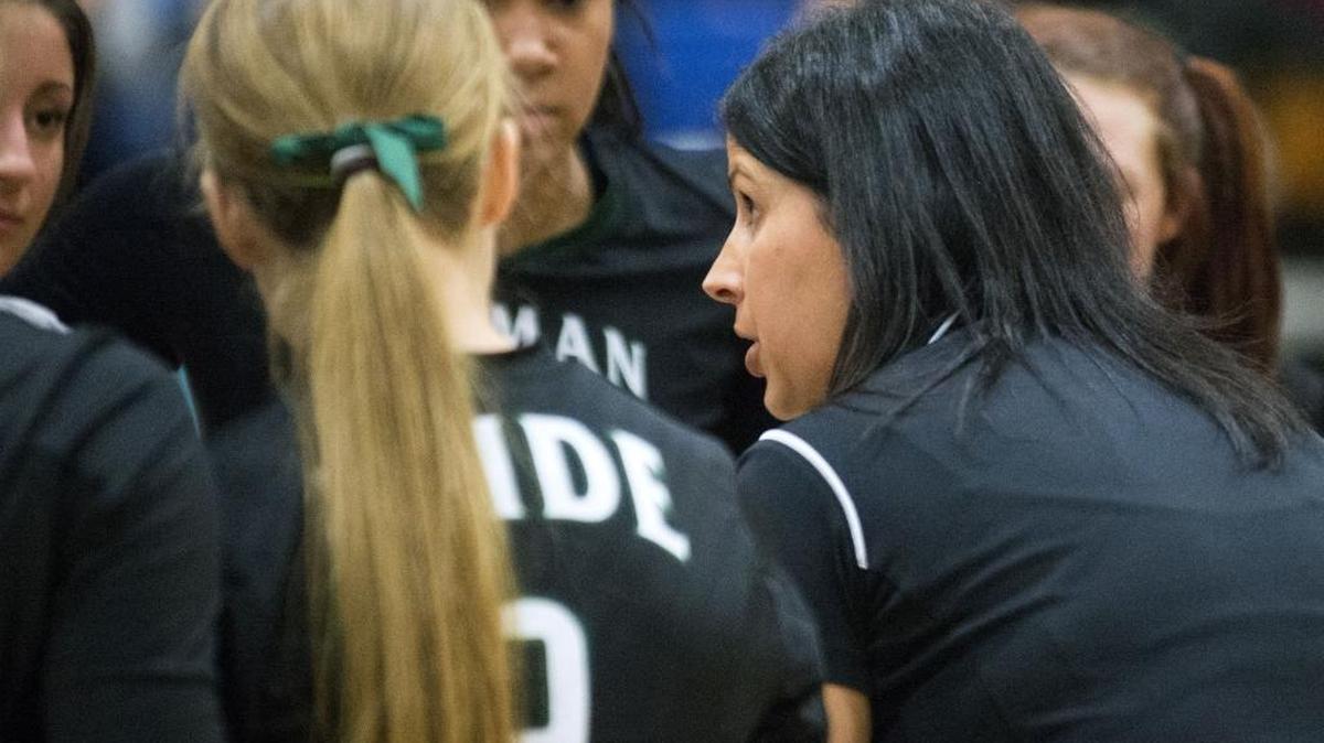 Pitman coach Kristen Pointes-Christian talks to her players during Sac-Joaquin Section Division I volleyball final between Pitman and Pleasant Grove at Tokay High School in Lodi Calif., Nov. 21, 2015.