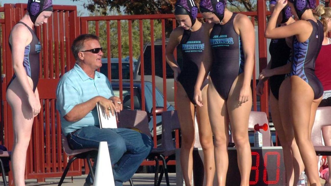 Johansen water polo coach Brent Bohlender talks to his team during first round of the Sac-Joaquin Section playoffs on Nov. 6, 2009.