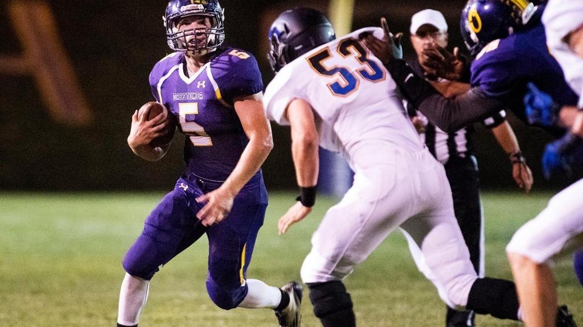 Orestimba Austin Martins runs the ball during the Southern League game with Ripon Christian at Orestimba High School in Newman Calif., on Friday, September, 25, 2015.
