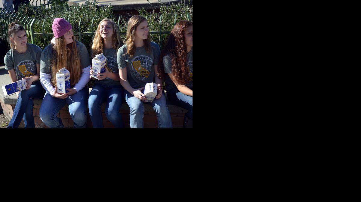 
Sonora High School students are pictured with milk cartons on Friday afternoon (01-23-15) at the school in Sonora, CA. Crystal Creamery, a sponsor of the Sac-Joaquin Section of the California Interscholastic Federation, produces special commemorative milk cartons featuring girls and boys Sac-Joaquin Section championship teams for fall, winter and spring sports.
