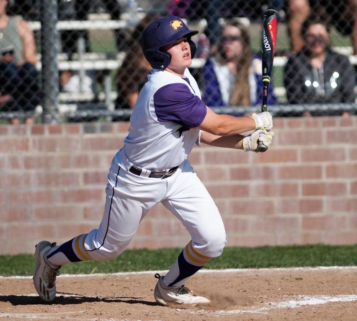 Escalon catcher Parker Cosby singles and later scored during the Trans Valley League game with Mountain House at Escalon High School in Escalon, Calif., on Wednesday, April 12, 2017.