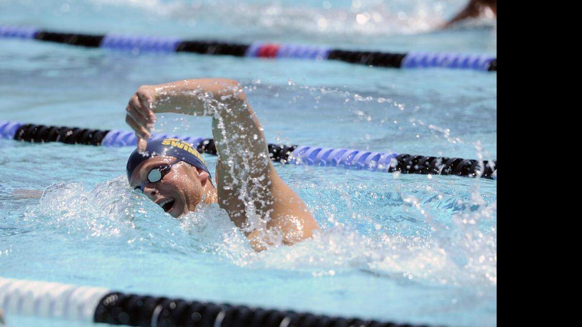 
Christian Britton of Gregori swims to victory in the boys 500-yard freestyle during the 11th annual Southern Section Swimming Championships at Johansen High School on Saturday.
