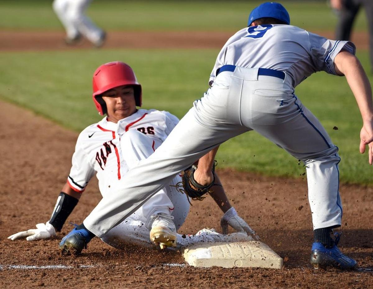 Modesto High School’s Carlos Castillo is tagged out at third base Thursday afternoon, March 9, 2017, during a game against Sierra High in the opening round of the Pedretti Baseball Tournament at Modesto High School.