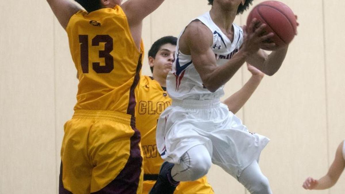 Beyer’s Jaden Cobb goes for a layup during the Modesto Classic championship game between Beyer and Clovis West at Enochs High School in Modesto California on December 3, 2016.