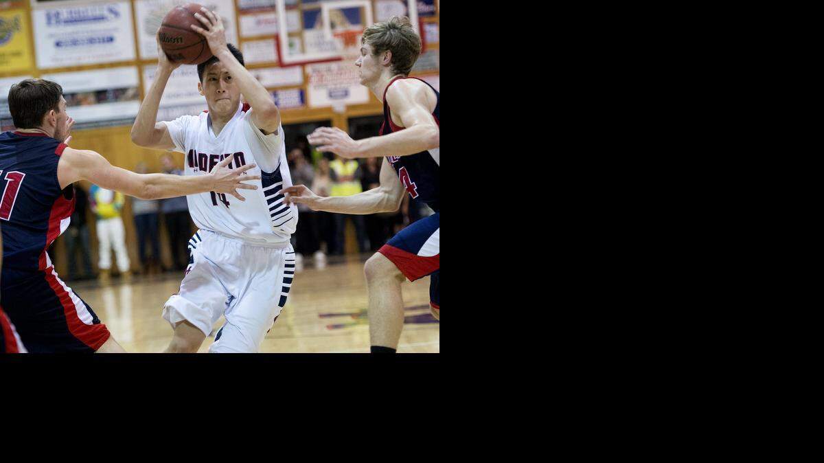 
Modesto Christian’s Jeff Wu drives against Campolindo in the Holiday Hoop Classic title game. Wu made a buzzer-beating three-pointer to force overtime and finished with 17 points. 


