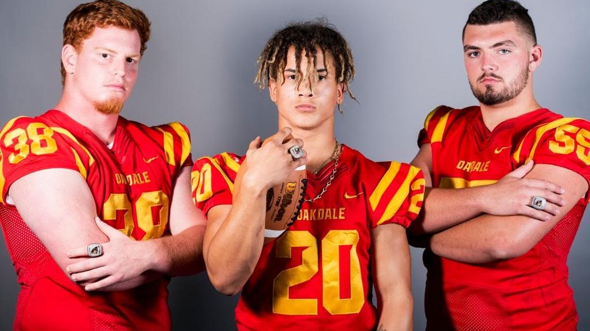 Oakdale High School football players Matthew Kjeldgaard, left, Cameron Cherry, center, and Nico Sarale pose for a portrait at the Merced Sun-Star office in Merced, Calif., on Thursday, July 27, 2017.