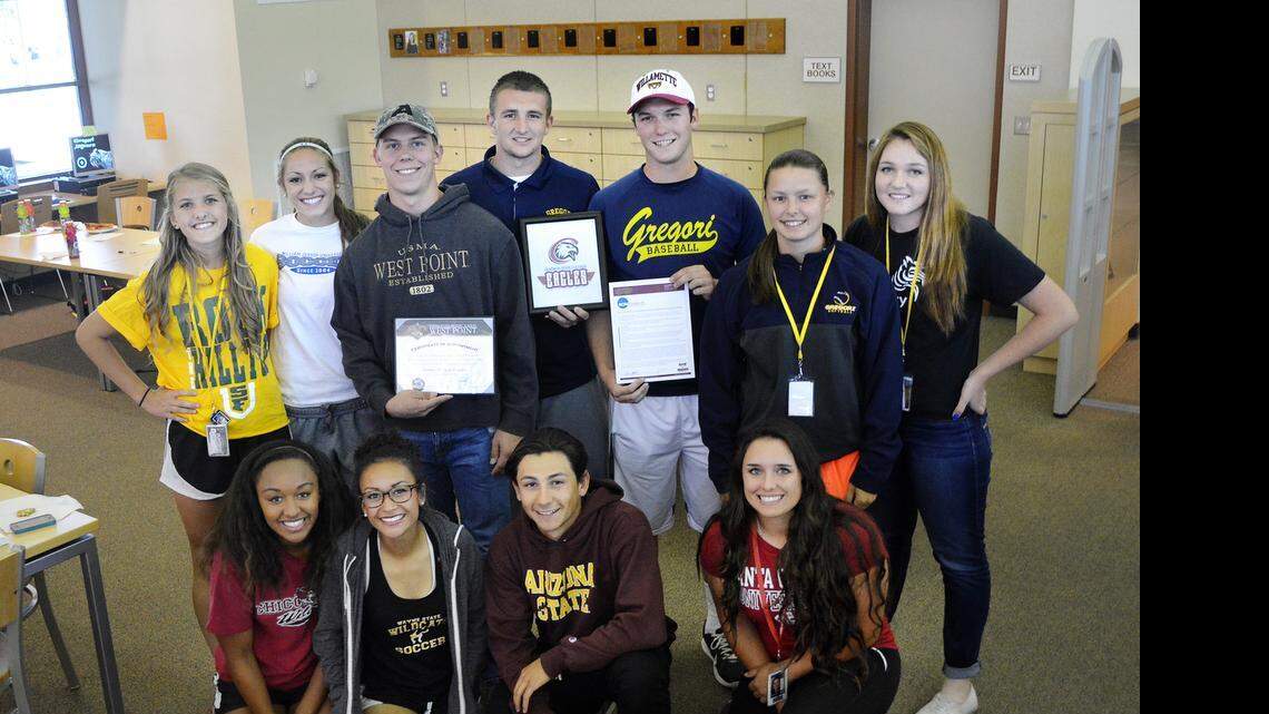 
Gregoti athletes pose at their signing ceremony Friday in the school's library. Top row, from left: Autumn Smithers, Allie Rocha, Tanner Goudeau, Matt Vargas, Tyler Janitz, Samantha Shaffer, Cassie Apple. Bottom row, from left: Mariah McDuffy, Karley Hall, Justin Cox and Morgan Modesto April 17, 2015 Joe Cortez/jcortez@modbee.com
