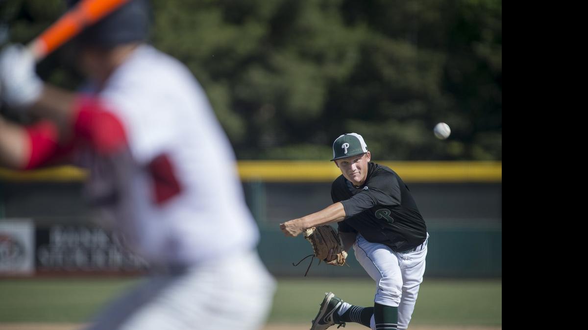 
Pitman pitcher Zach Wichman delivers a pitch during the Sac-Joaquin Section Division I baseball playoff game with Beyer in Stockton, Calif., on Monday, May, 18, 2015. Pitman won the game 7-2.

