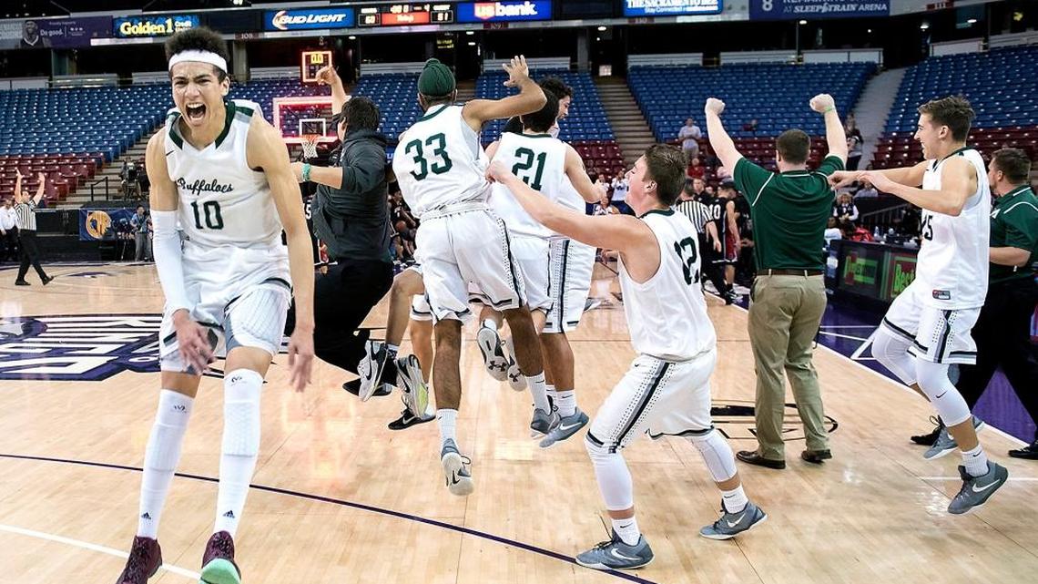 Tydus Verhoeven, left, and his teammates celebrate their 60-51 victory over Ayala in the CIF State Division III championship at Sleep Train Arena in Sacramento, Calif., on Thursday, March, 24, 2016.