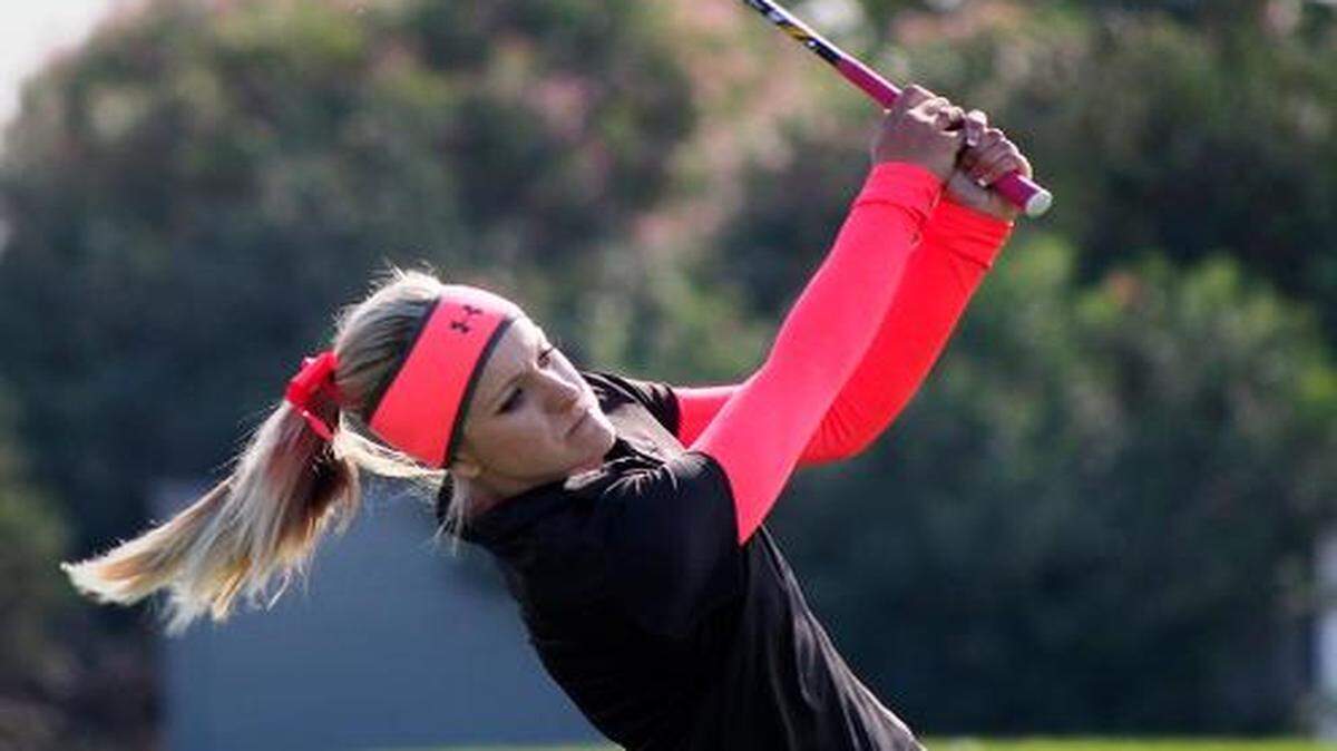 
Alyse Padilla of Enochs hits from the 15th hole tee at the Sac-Joaquin Section Masters Golf Championship at the Reserve at Spanos Park in Stockton, Nov. 3, 2014. 
