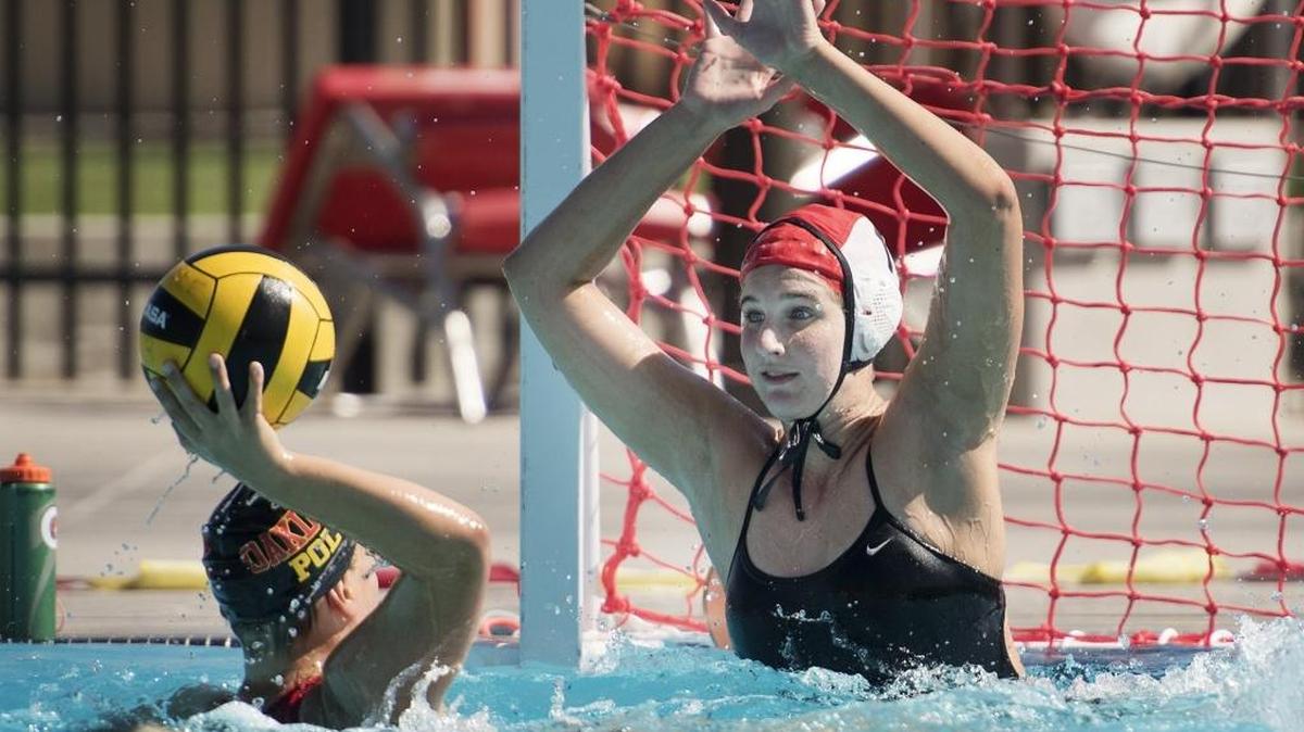 
Oakdale goalie Caitlin Golding defends the goal as Whitney Lee takes a shot during a practice drill at Oakdale High School in Oakdale, Calif., on Thursday, Sept. 3, 2015.
