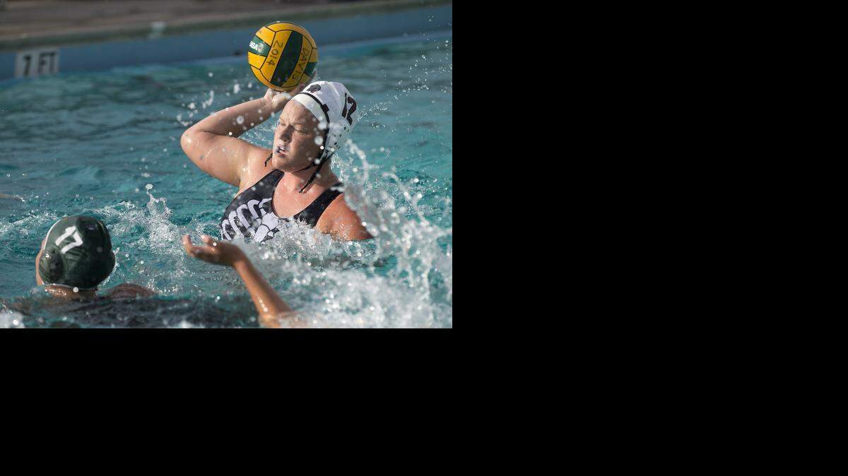 
Modesto's Sophia Mesches rises up to score a goal during the Modesto Metro Conference game with Davis at Grace Davis HIgh School in Modesto, Calif., on Thursday, October 30, 2014. Modesto won the match and finished with a record of 12-0 in conference.
