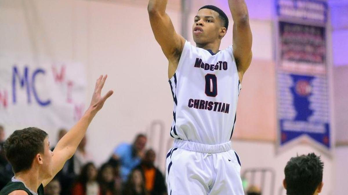 Modesto Christian’s Darrian Grays shoots a 3-pointer in Friday’s win over Manteca in the Modesto Christian Hoops Holiday Classic.