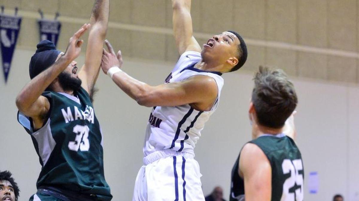 Modesto Christian Darrian Greys (0) goes up for a layup during the 3rd place game where Modesto Christian defeated Manteca 63-48 at the Modesto Christian Hoops Holiday Classic at Modesto Christian High School in Modesto California on December 30, 2016.