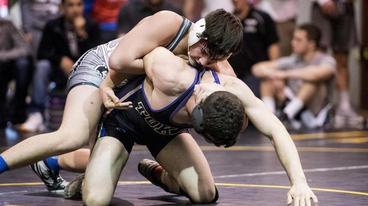 Pitman's Isaiah Perez, top, controls, Tokay's Dylan Kranich, bottom, in the 170-pound finals match of the Sac-Joaquin Section Division I-AA Wrestling Tournament at Pitman High School in Turlock, Calif., on Saturday, Feb. 18, 2017.