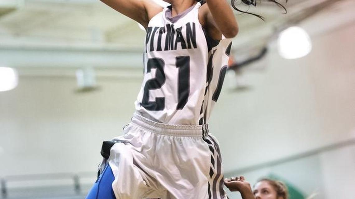 Pitman's Kaylin Randhawa scores during the Central California Conference game with Golden Valley in Turlock, Calif., on Tuesday, Jan. 26, 2016.