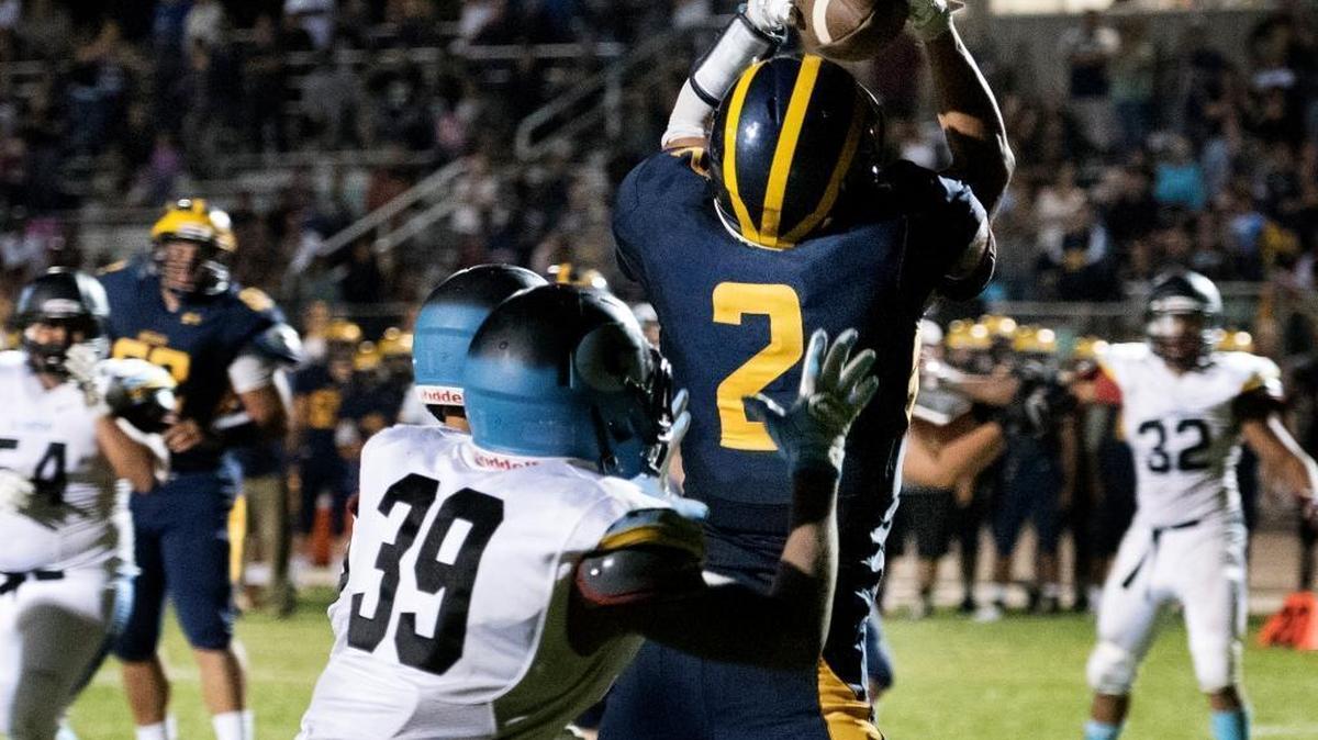 Gregori's Tony Cristobal makes a touchdown catch during the fourth quarter drive to put the Jaguars within a point of El Capitan at Gregori High School in Salida, Calif., on Friday, September 9, 2016.