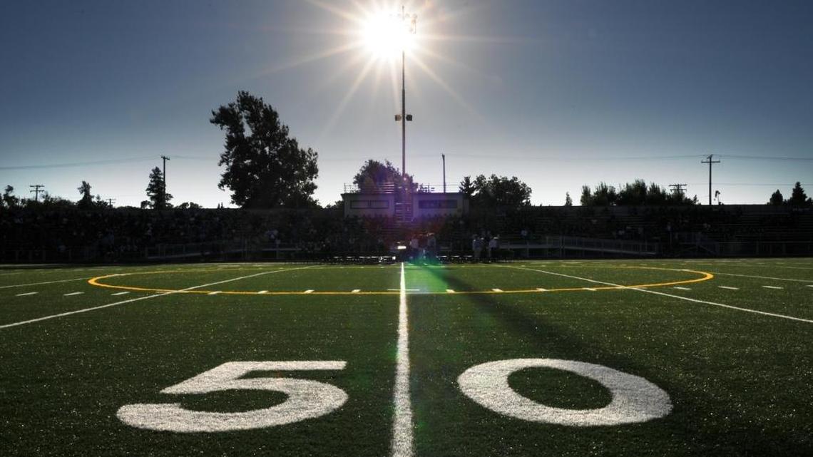 (BART AH YOU/bahyou@modbee.com) - Turlock High School's Joe Debely Stadium, Wednesday evening. The Turlock Union School District presented the newly constructed staduim to the community with a public ceremony. Players and the general public were able to touch the turf and enjoy the evening with food and refreshments. August 26, 2010
