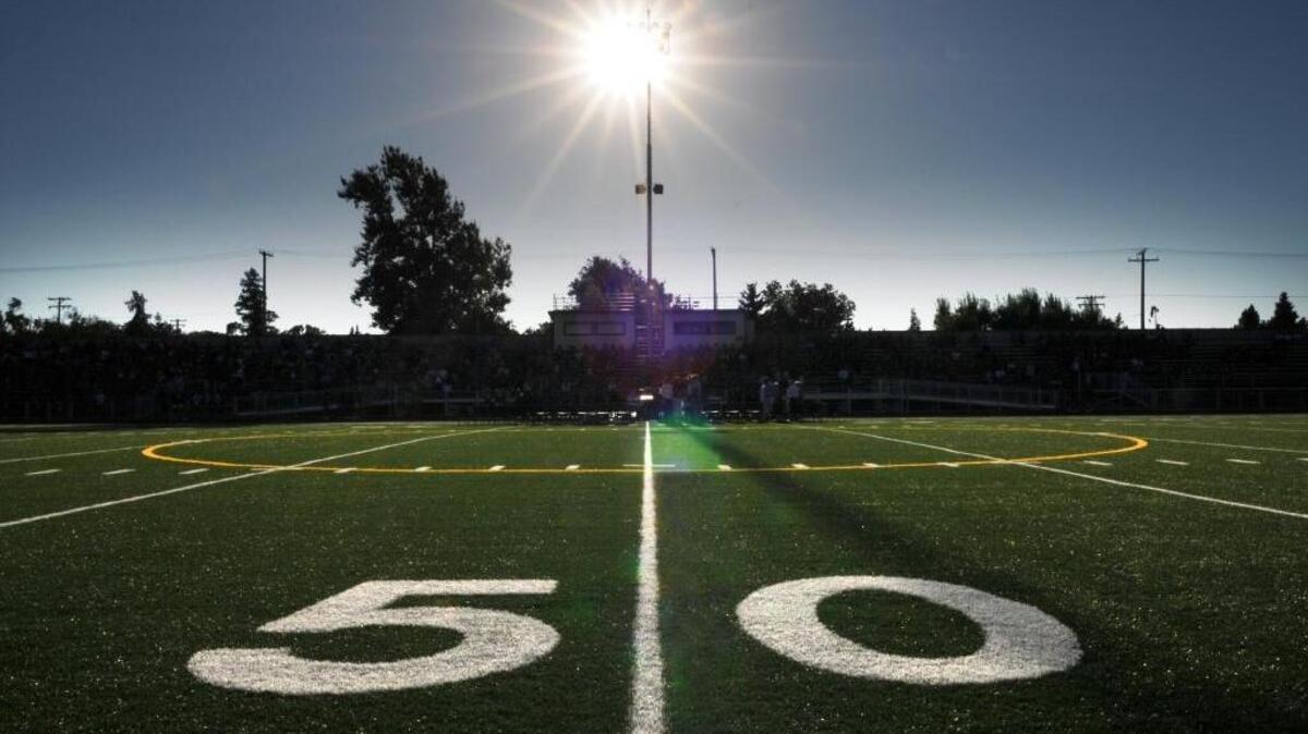 (BART AH YOU/bahyou@modbee.com) - Turlock High School's Joe Debely Stadium, Wednesday evening. The Turlock Union School District presented the newly constructed staduim to the community with a public ceremony. Players and the general public were able to touch the turf and enjoy the evening with food and refreshments. August 26, 2010