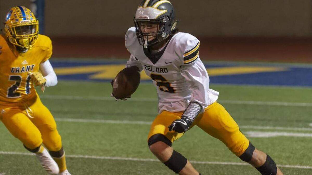 Del Oro High School Golden Eagle Johnny Guzman (6), runs with the ball during the second quarter as the Grant High School Pacers host the Del Oro High School Golden Eagles, Friday Oct 12, 2018.
