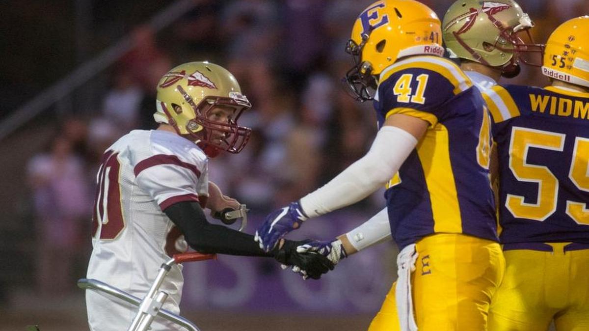 
Calaveras senior Kyle Chaboya meets with Escalon’s Dustin Lawrence on Sept. 4. Chaboya, who was born with cerebral palsy, scored his first touchdown Friday. 
