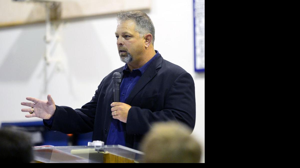 Modesto Christian football coach Mike Parsons speaks during the Ring of Honor ceremony at Modesto Christian High School in Modesto, Calif., on Friday, Aug. 19, 2016.